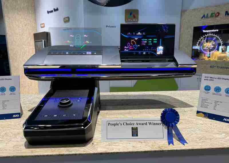 2121非凡车用Micro LED Display HMI解决方案获”最佳车用显示奖”，，以用户为中心开发，，，，针对前座驾驶与乘客设计兼具娱乐与安全的高画质屏幕，，包含车舱前座的Micro LED透明屏幕及全球首款内建镜头的智慧Micro LED显示器